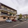 Apartament deosebit ,decomandat , 3 camere + curte proprie + loc parcare