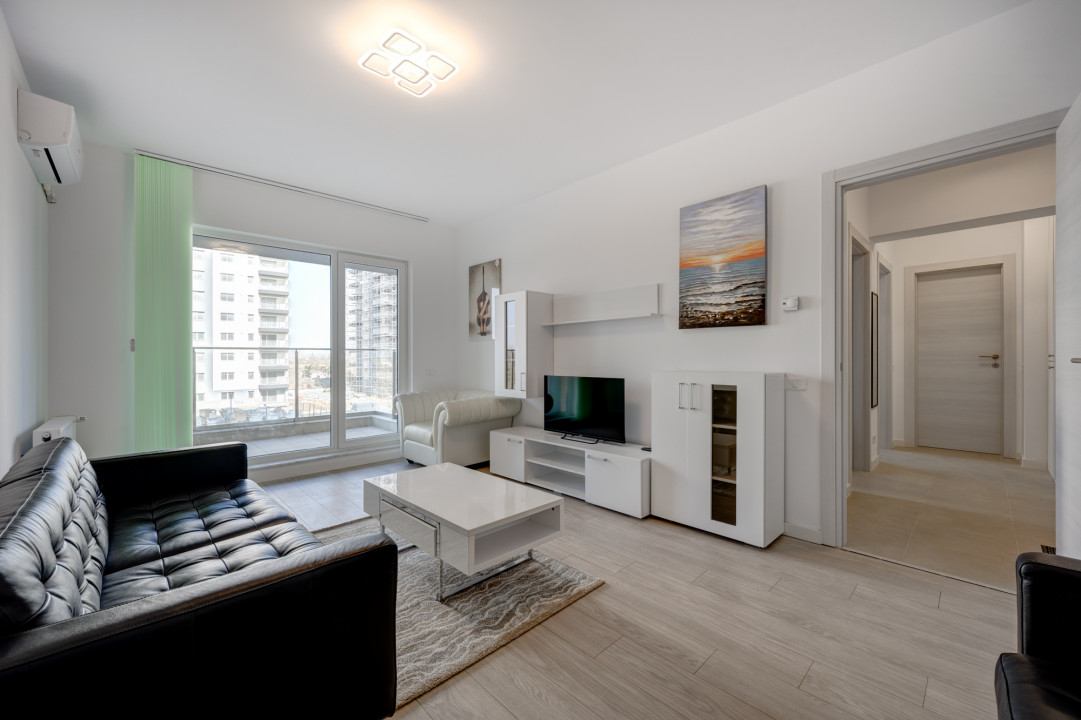 Apartament cu 2 camere - decomandat - mobilat complet - loc parcare - piscina