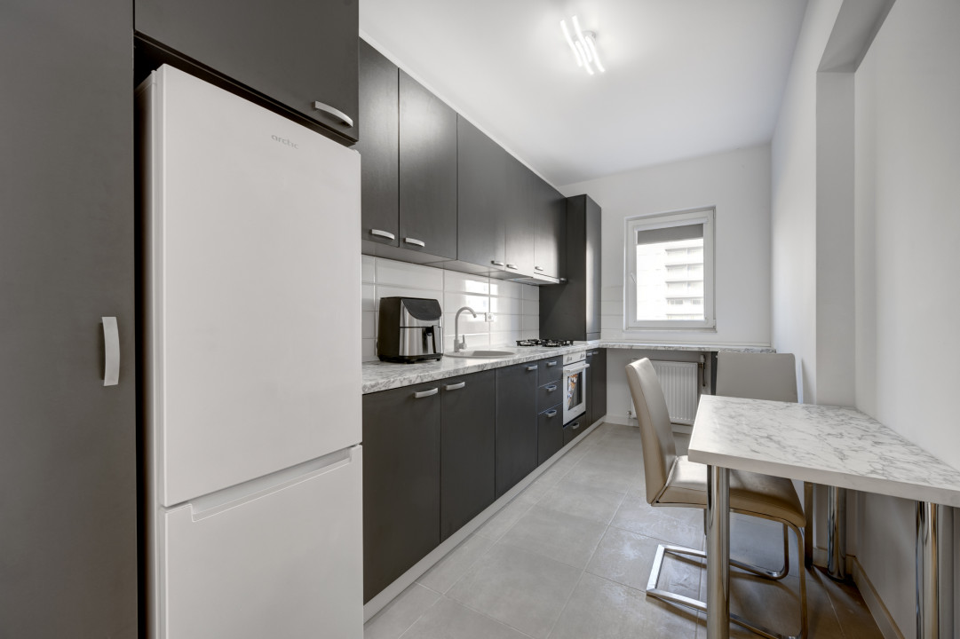 Apartament cu 2 camere - decomandat - mobilat complet - loc parcare - piscina