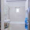 Apartament spatios , decomandat  , cu 2 balcoane si cu bucataria mobilata